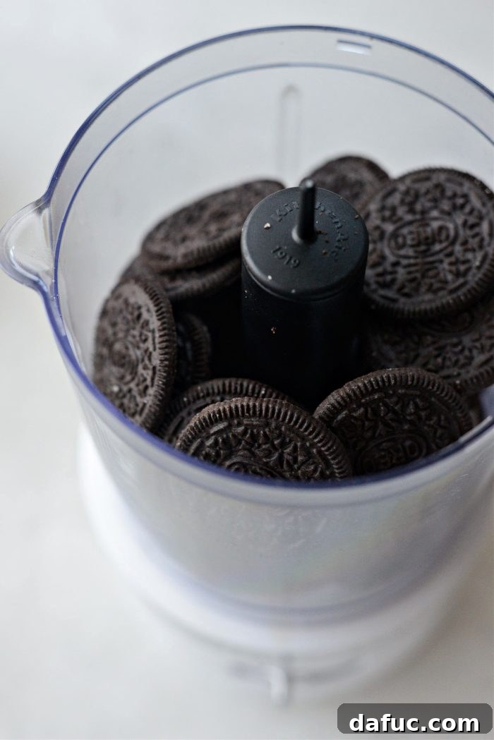 Decadent Chocolate Garden Delight 19 Twisting open Oreo cookies and scraping out cream filling