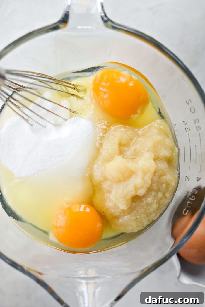 Decadent Chocolate Garden Delight 8 Eggs, granulated sugar, and unsweetened applesauce in a separate mixing bowl