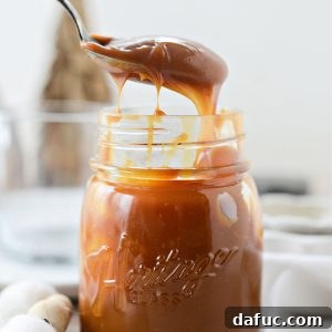 Spoonful of golden Caramel Brûlée Sauce