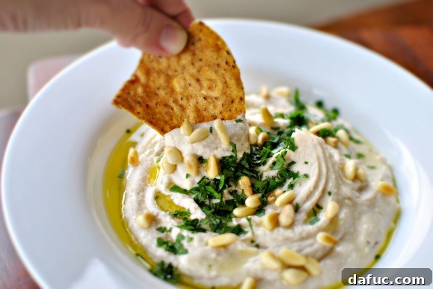 Zesty Roasted Lemon White Bean Dip 2 Roasted Lemon White Bean Hummus with tortilla chips