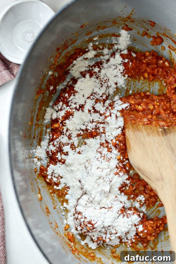 Sprinkling flour into the pot.
