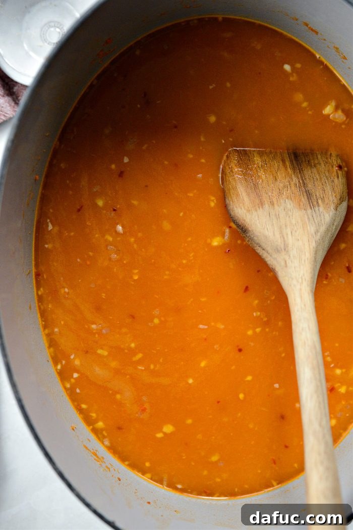 Stirring until no lumps remain.