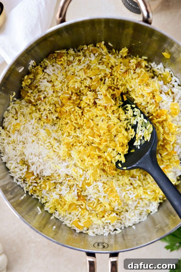 Golden Turmeric Rice 11 Toasting basmati rice with spices for 2 minutes