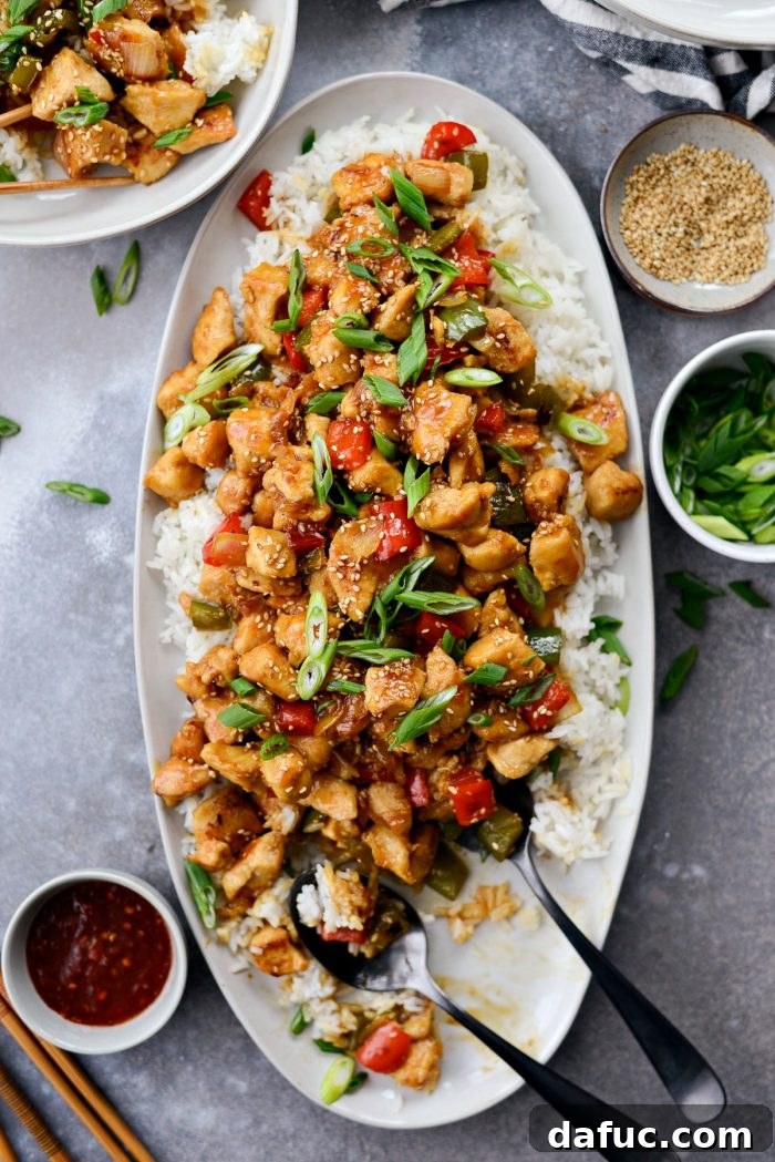 Guilt-Free Sesame Chicken 19 Healthy Sesame Chicken Served with Rice and Green Onions