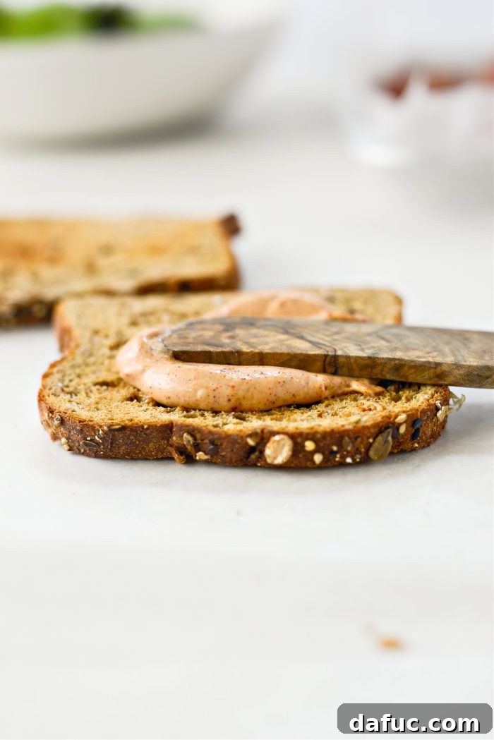 Chipotle-Kissed Salmon BLT 13 Toasting bread and spreading chipotle mayo on slices