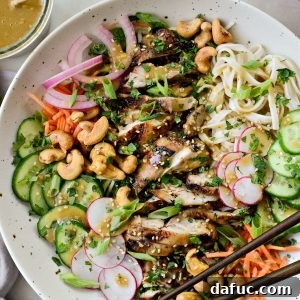 Savory Sesame Grilled Chicken Noodle Bowls 12 Grilled Sesame Chicken Noodle Bowls, close up on a finished bowl