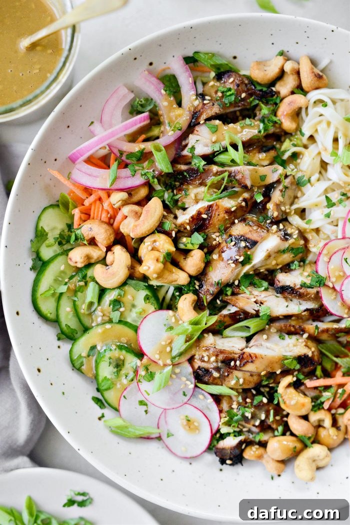 Savory Sesame Grilled Chicken Noodle Bowls 10 A vibrant and colorful grilled sesame chicken noodle bowl, ready to be enjoyed