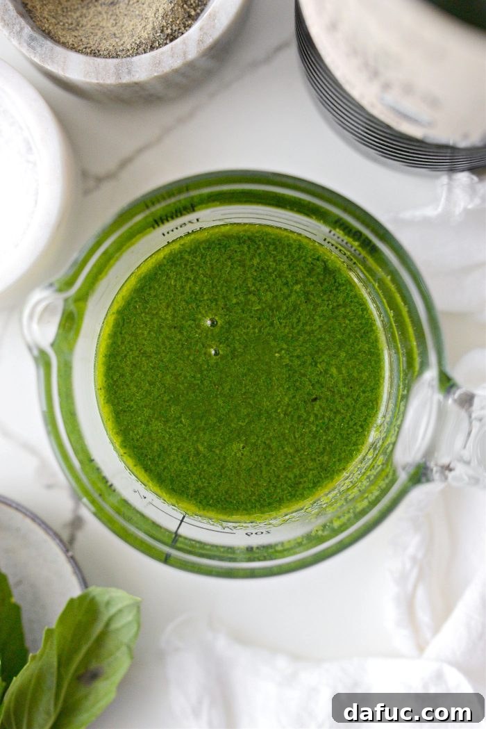 Effortless Fresh Basil Oil 7 Finished Basil Oil in a Container