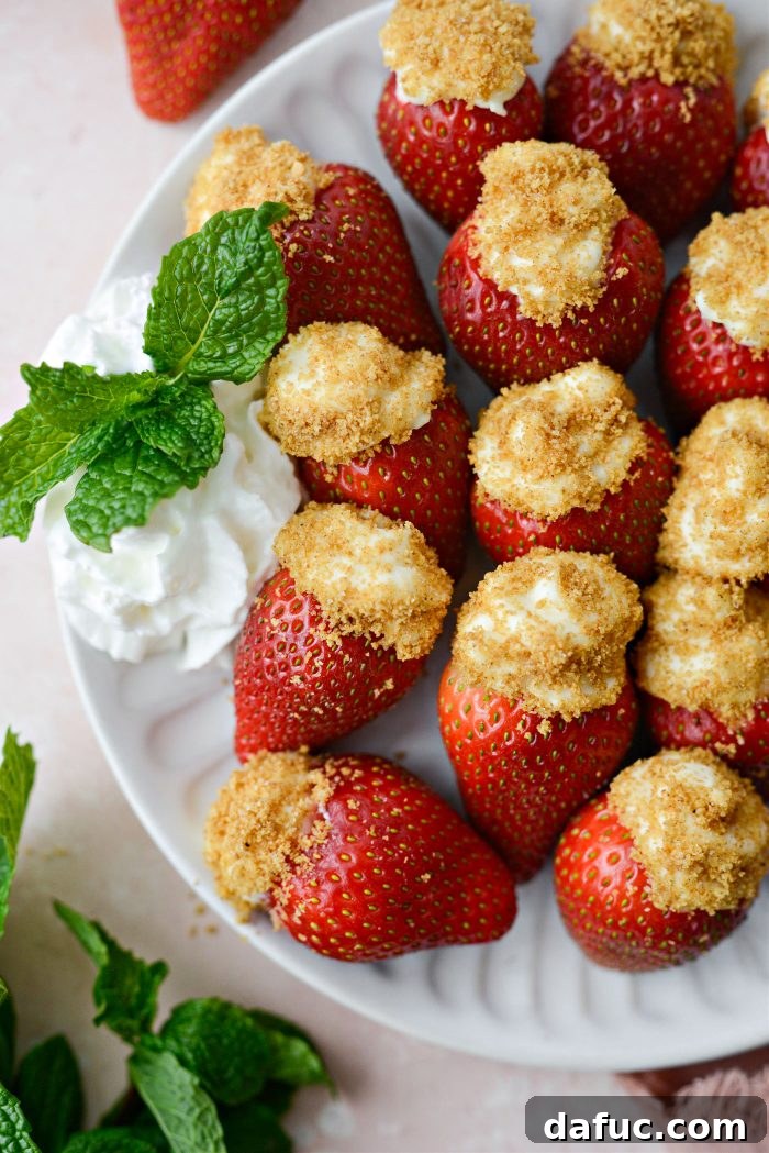 Creamy Strawberry Cheesecake Bites 2 Cheesecake Filled Strawberries, a delightful no-bake dessert