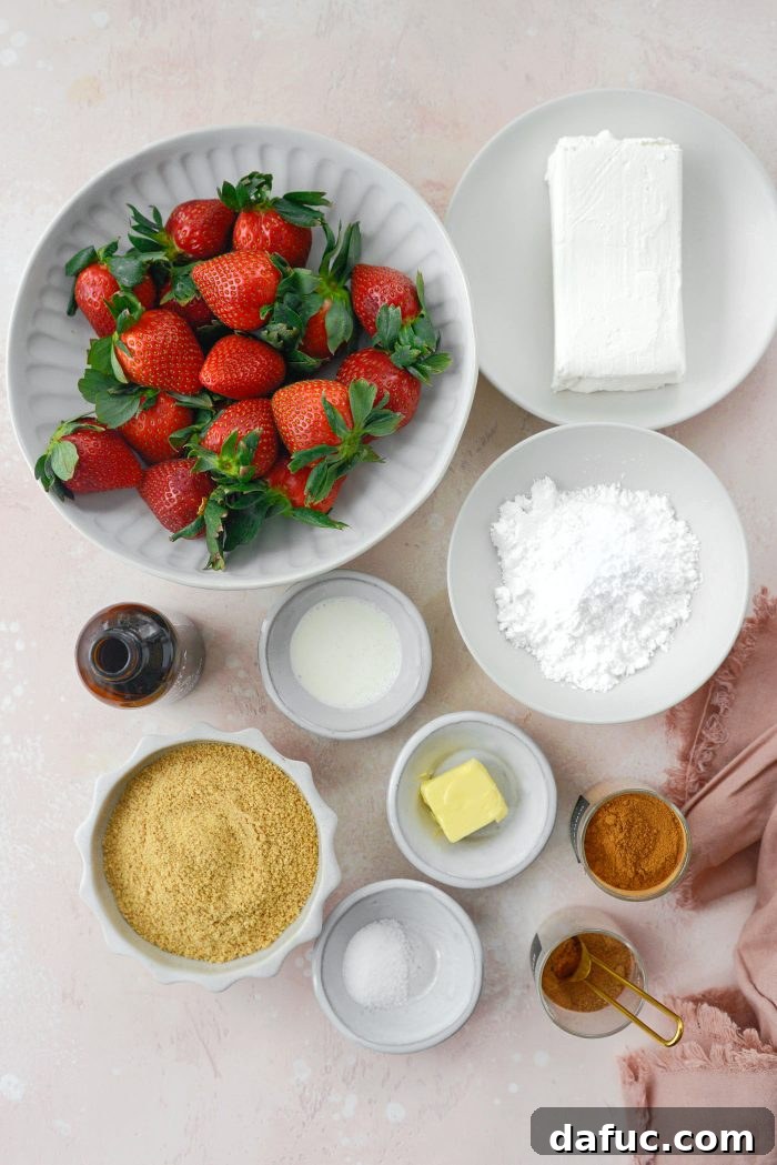 Creamy Strawberry Cheesecake Bites 3 Two Cheesecake Filled Strawberries on a small plate