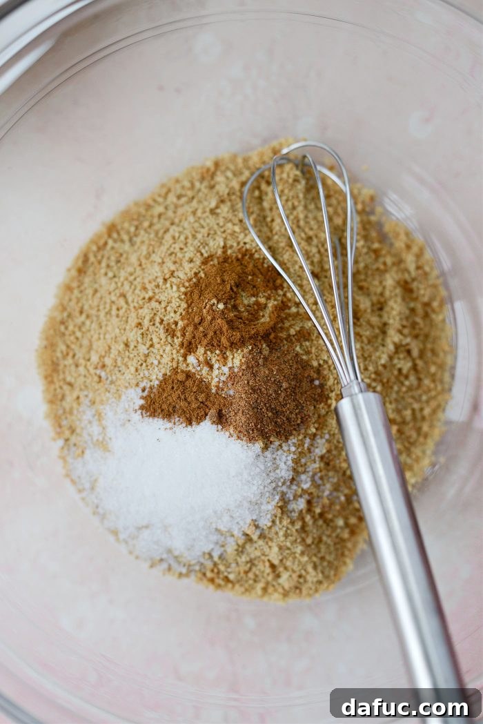 Creamy Strawberry Cheesecake Bites 5 Bowl with graham cracker crumbs, sugar, nutmeg, and cinnamon