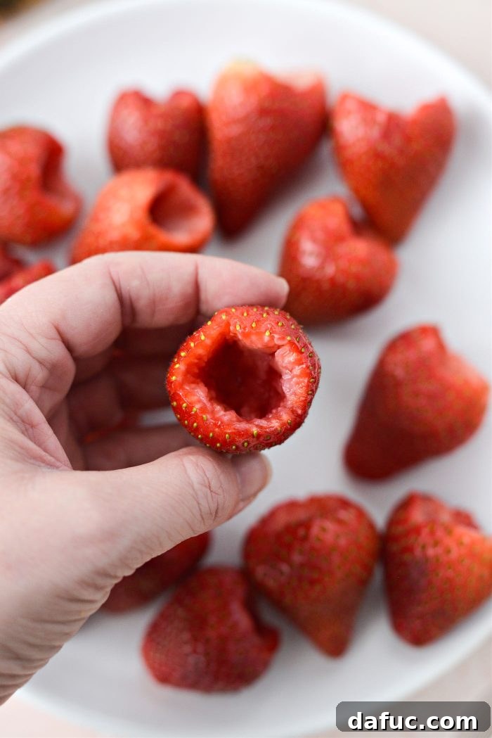 Creamy Strawberry Cheesecake Bites 10 Hollowed out strawberry ready for filling