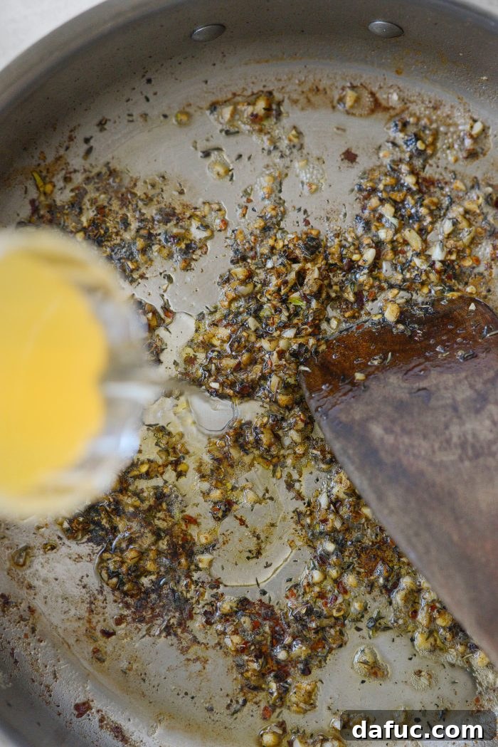 The I Do Chicken 13 Deglazing the pan with chicken broth to release savory fond