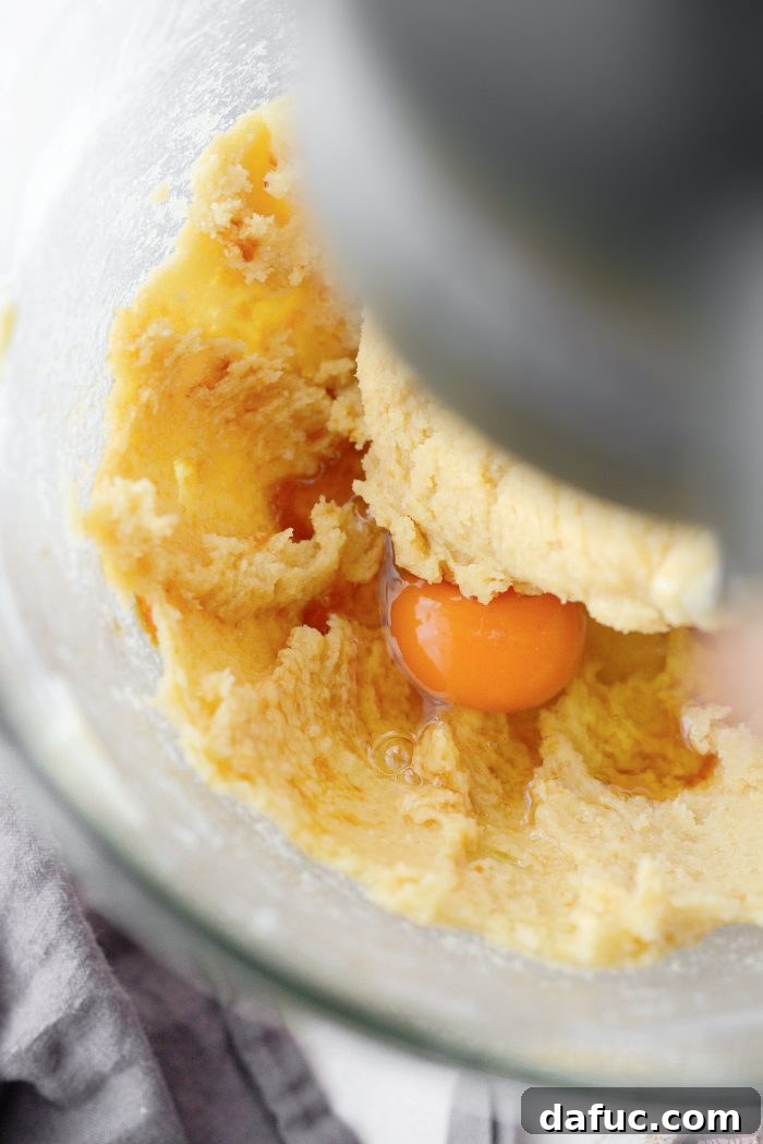 Creamed butter and sugar mixture with eggs and vanilla