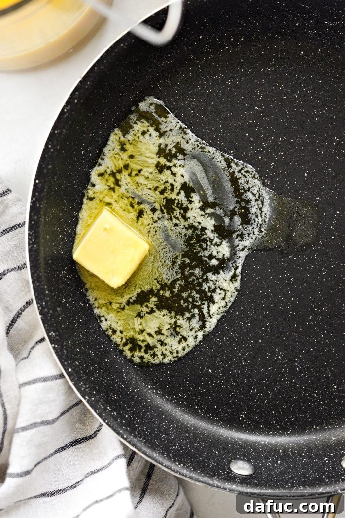 Adding butter to a hot skillet