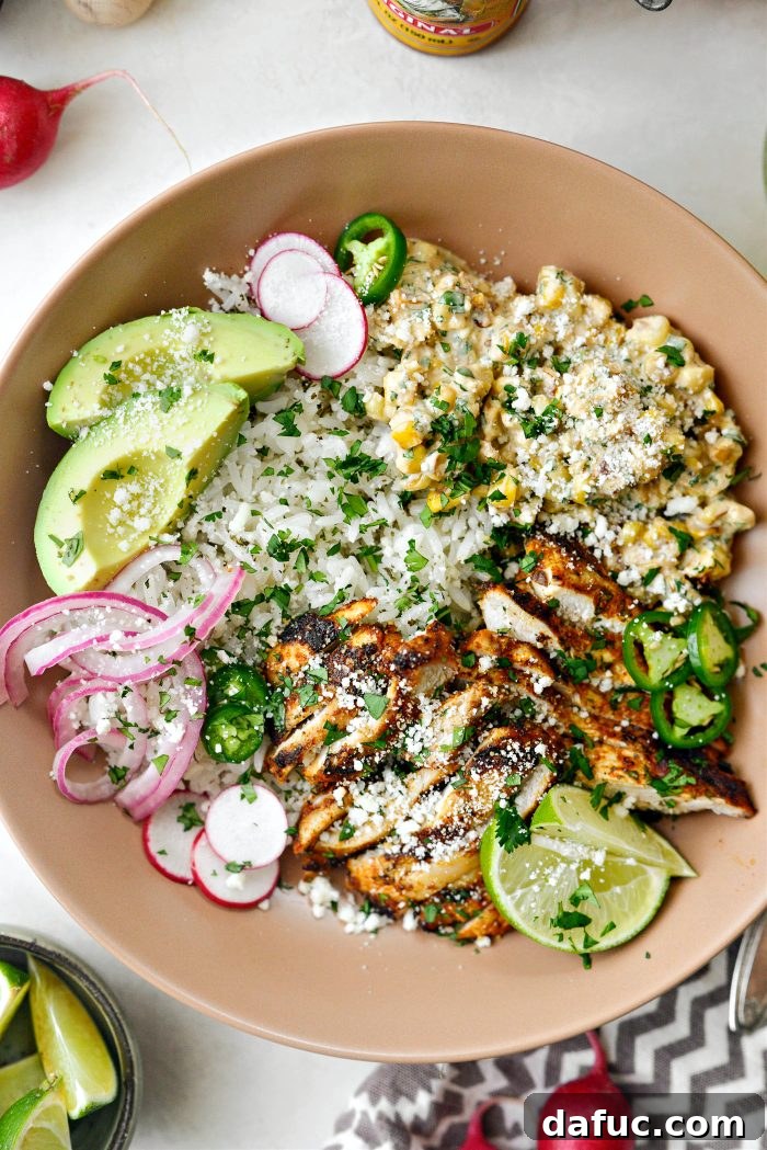 Smoky Chicken Elote Bowls 17 A close-up of a fully assembled Grilled Chicken Mexican Street Corn Bowl