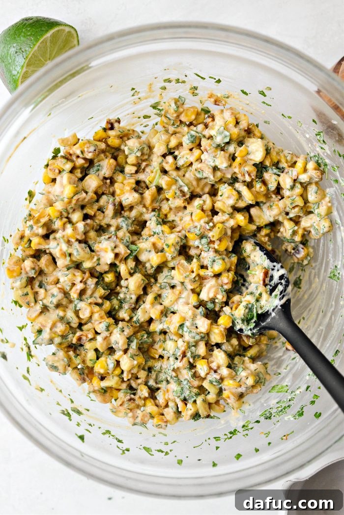 Smoky Chicken Elote Bowls 10 Finished Mexican street corn salsa mixture in a bowl
