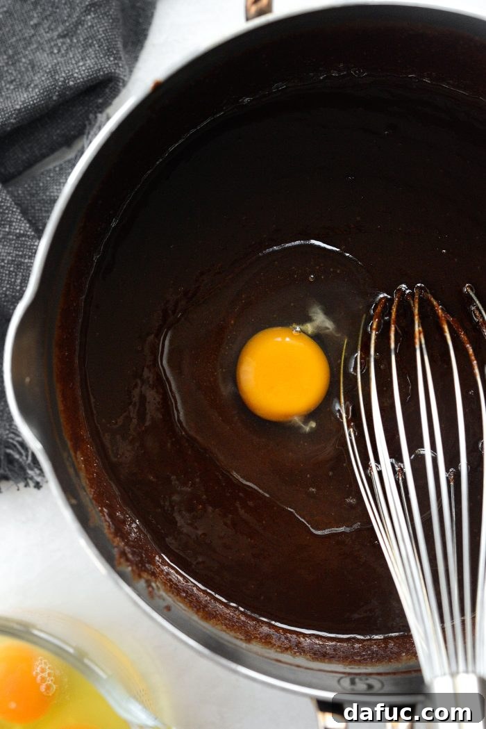 add in one egg at a time