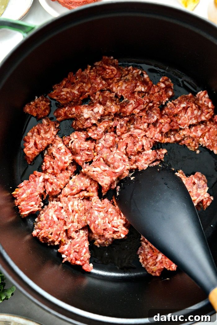 add oil and Italian sausage to large dutch oven