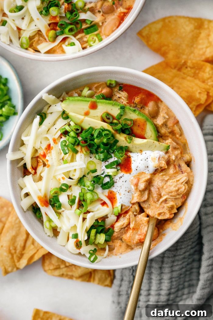 Slow Cooker Buffalo Chicken Chili with toppings