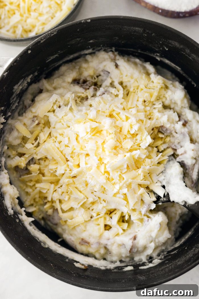 add cheese to mashed potatoes