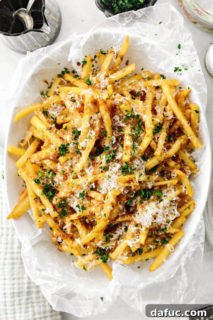 Decadent Truffle Parmesan Fries 11 Sprinkling finely chopped fresh parsley over the finished Parmesan truffle fries