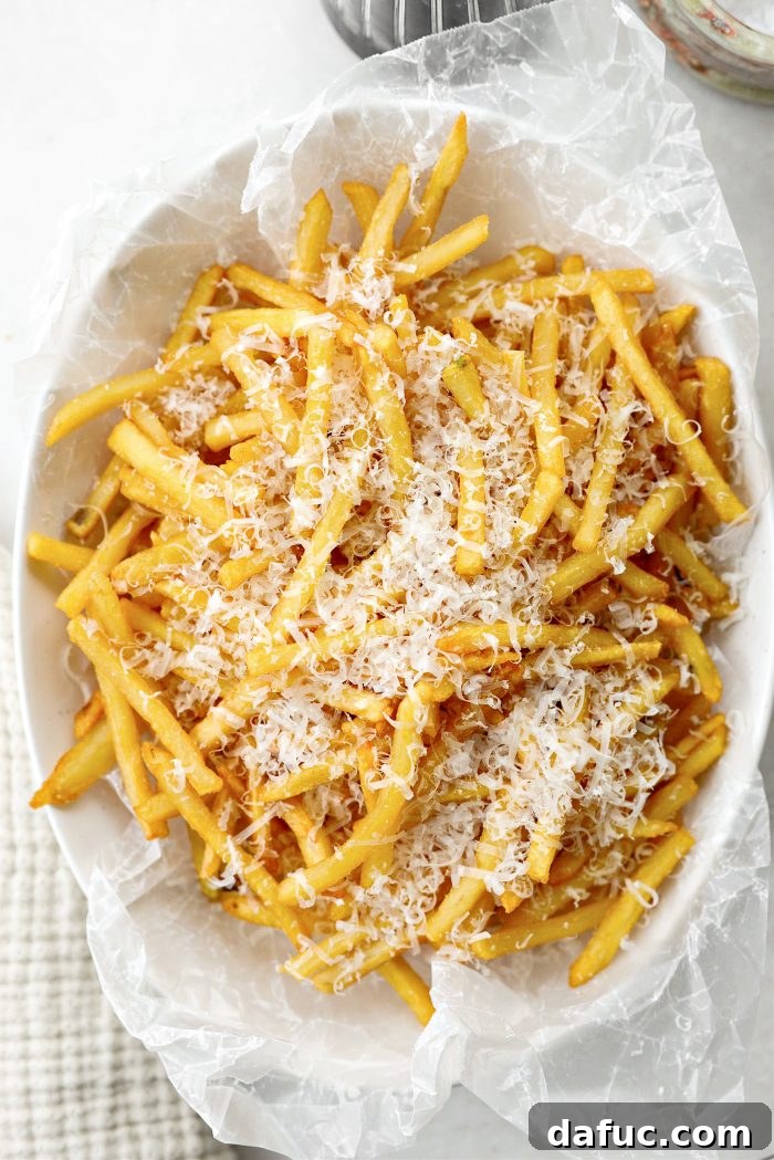 Decadent Truffle Parmesan Fries 9 Drizzling balsamic glaze over Parmesan truffle fries