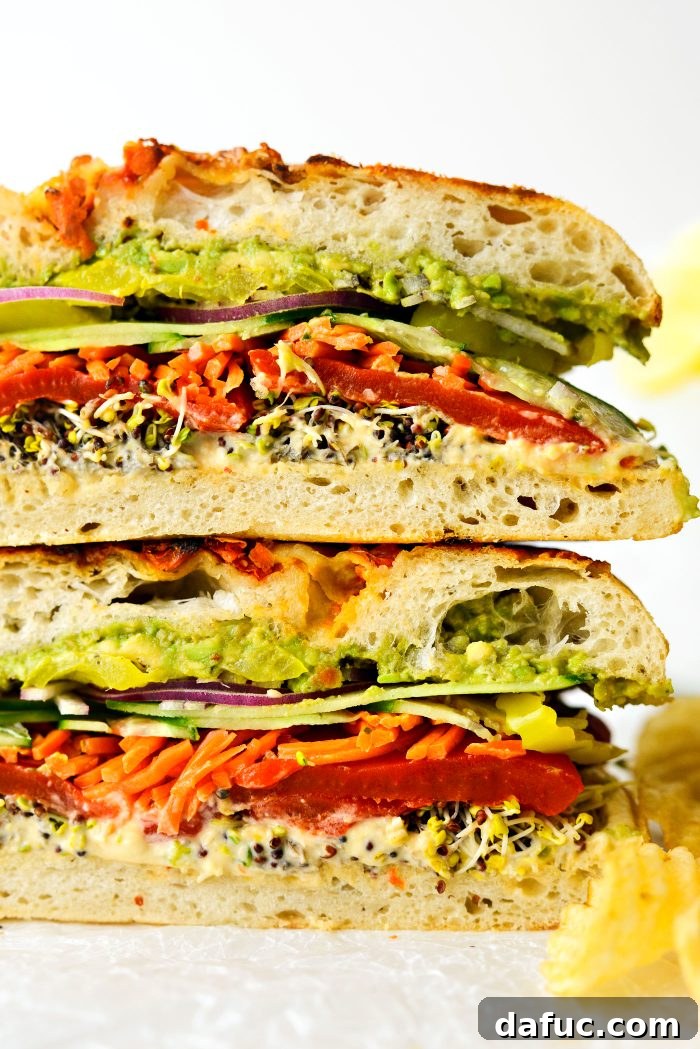 Vibrant Rainbow Stack 2 Rainbow Veggie Sandwich - A colorful vegetarian delight
