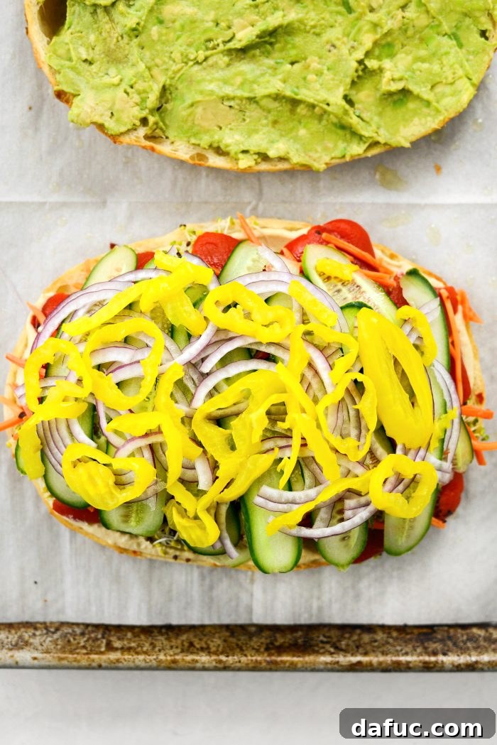 Vibrant Rainbow Stack 14 Final layer of banana peppers before closing the sandwich
