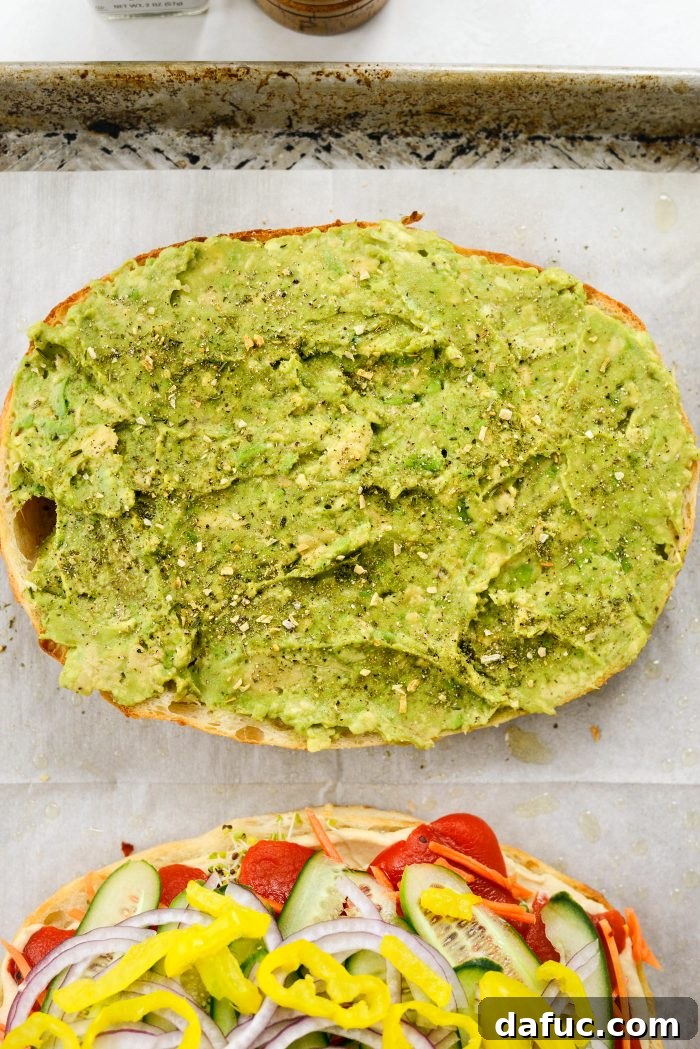 Vibrant Rainbow Stack 15 Seasoning the smashed avocado side with Green Goddess seasoning and black pepper