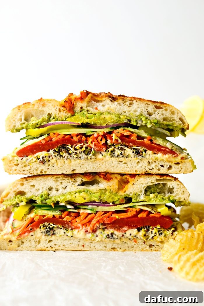 Vibrant Rainbow Stack 18 Another perspective of the Rainbow Veggie Sandwich, showcasing its height and layers