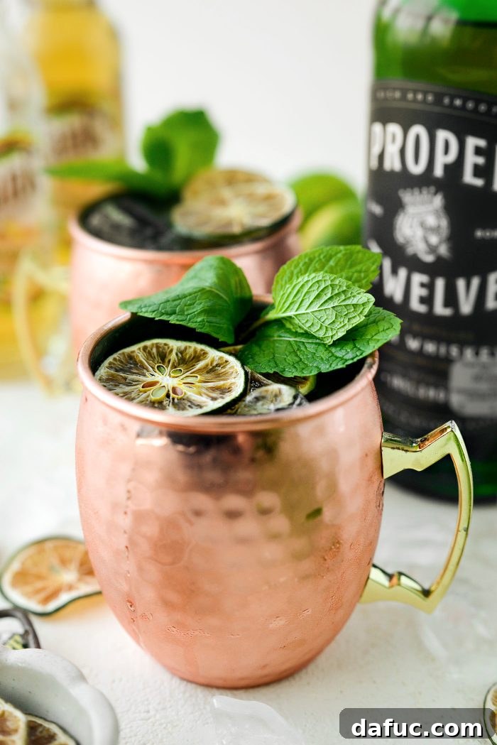 Emerald Kick 2 Irish Mule cocktail with fresh mint and lime