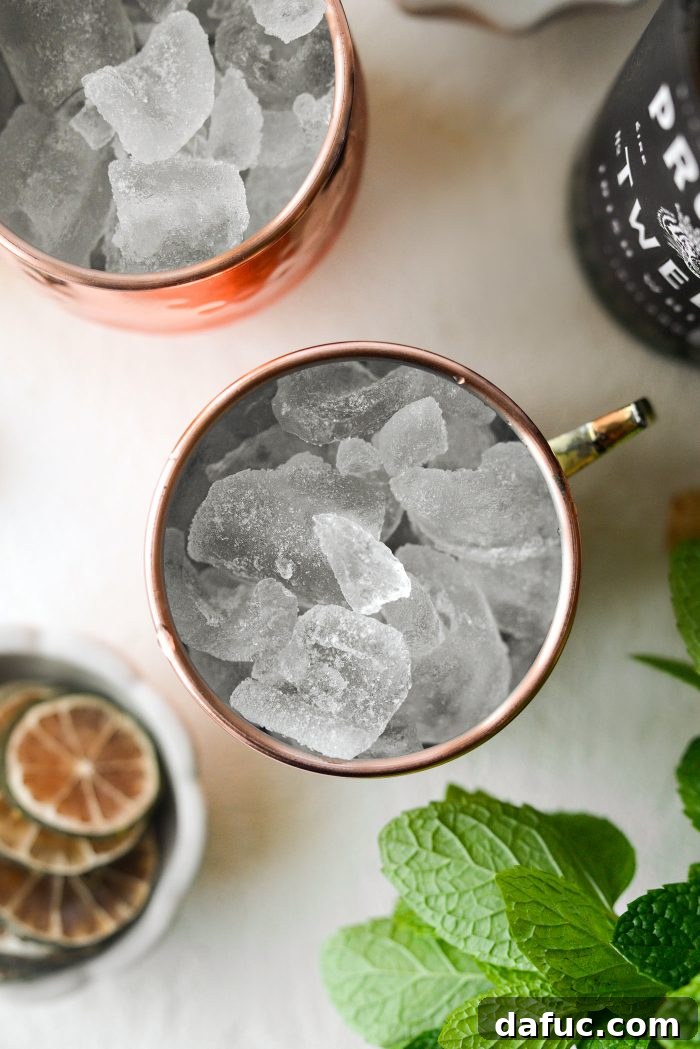 Emerald Kick 5 Fill copper mug with ice