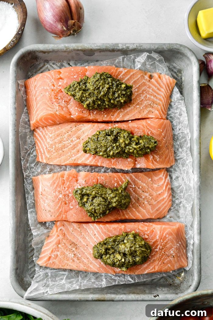 seasoned salmon topped with pesto