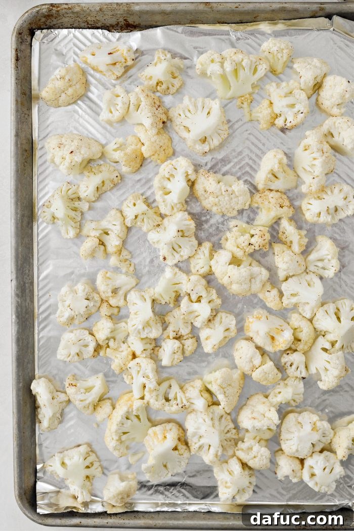 Crispy Bacon & Cheddar Roasted Cauliflower 9 Seasoned cauliflower florets spread evenly on a baking sheet