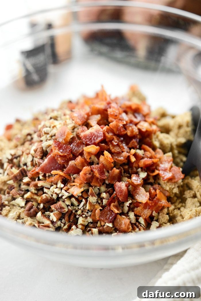 Adding chopped pecans and crispy bacon to the streusel crumb mixture