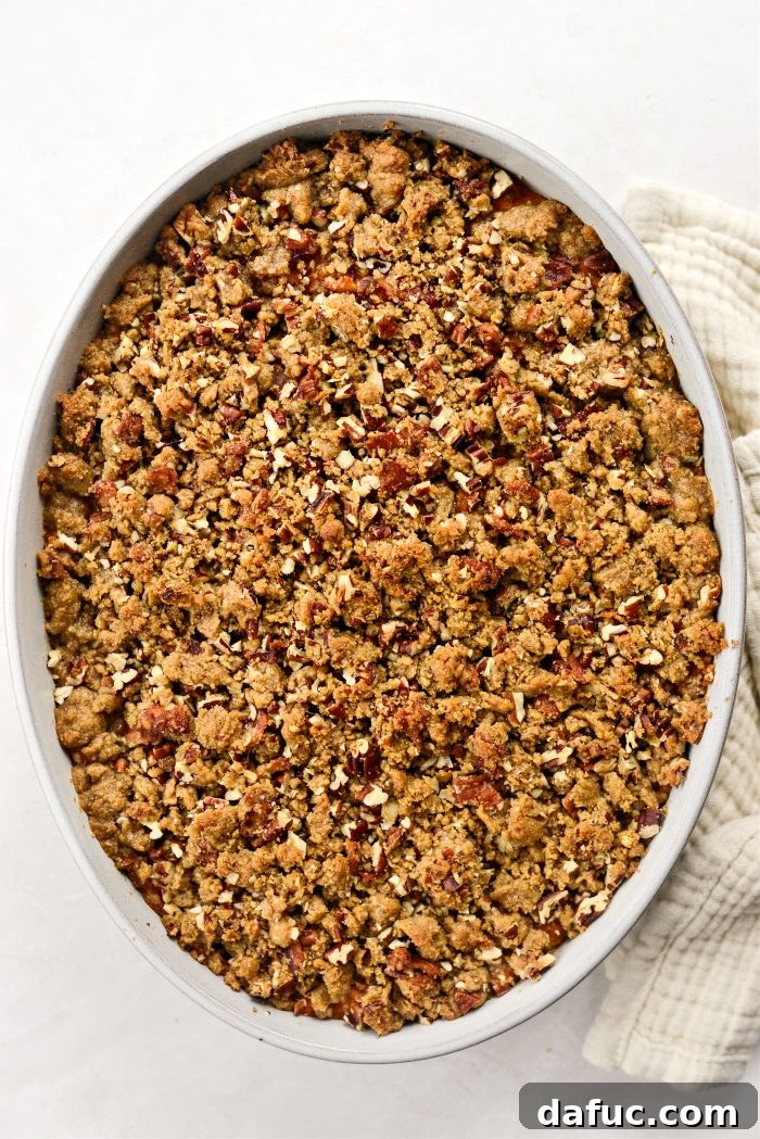 Sweet potato casserole warmed through with golden crumb topping
