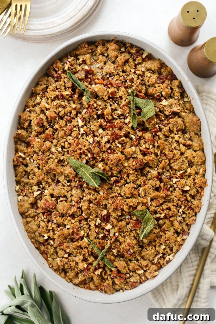 Maple Bourbon Bacon Sweet Potato Casserole garnished with crispy sage