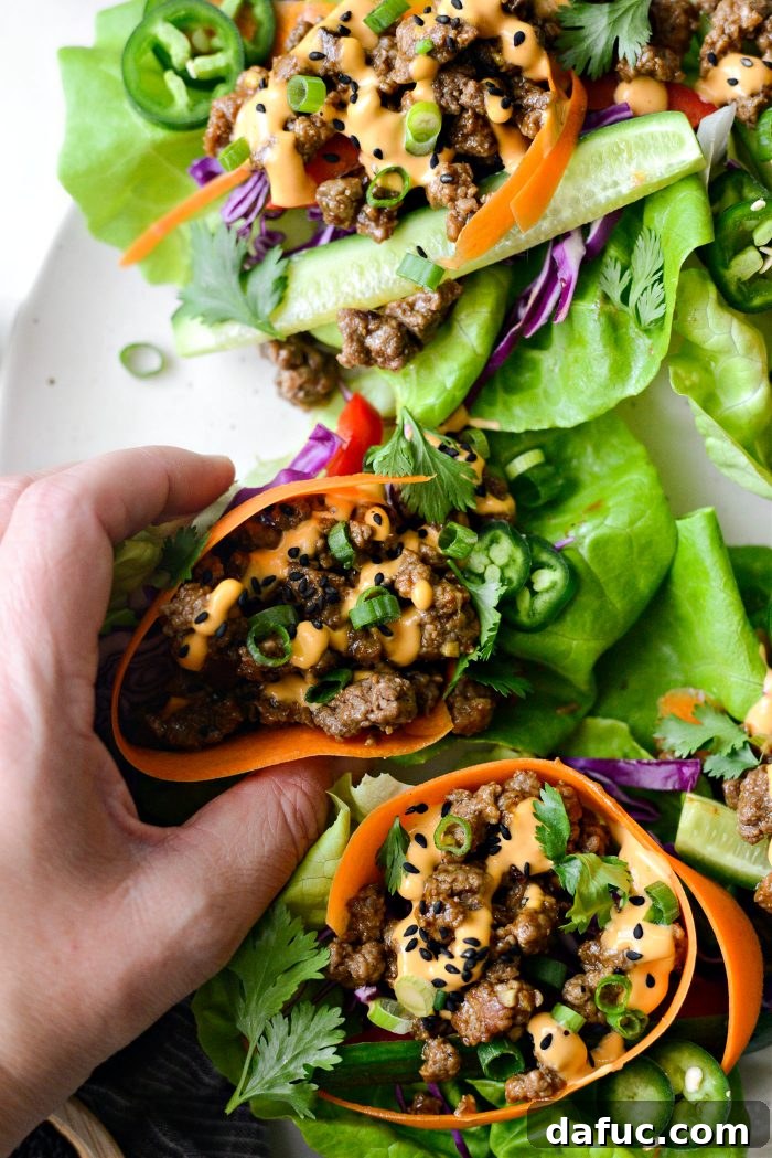 Spicy Sriracha Steak Lettuce Cups 15 A platter of vibrant Sriracha Steak Lettuce Wraps