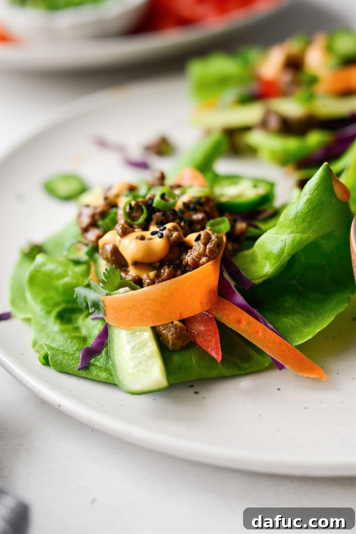 Spicy Sriracha Steak Lettuce Cups 16 A stack of perfectly assembled Sriracha Steak Lettuce Wraps