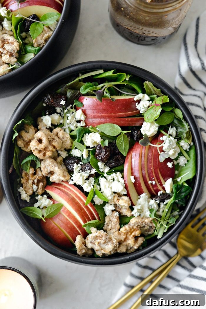 fill bowls and top with apples, dried cherries, candied walnuts and blue cheese