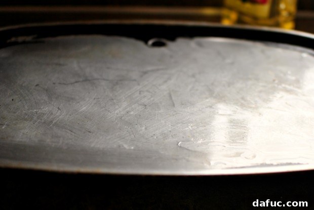 Lightly oiling a griddle