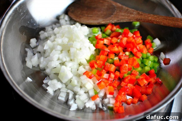 Sautéing peppers and onions for veggie burgers