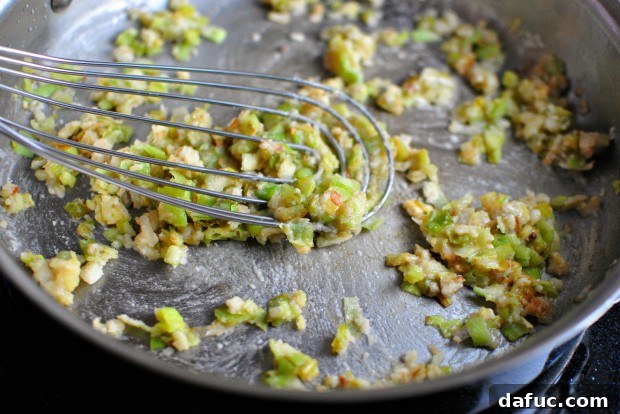 Silky Pancetta, Leek, and Sweet Pea Mac & Cheese 14 Whisking flour and butter to form a paste