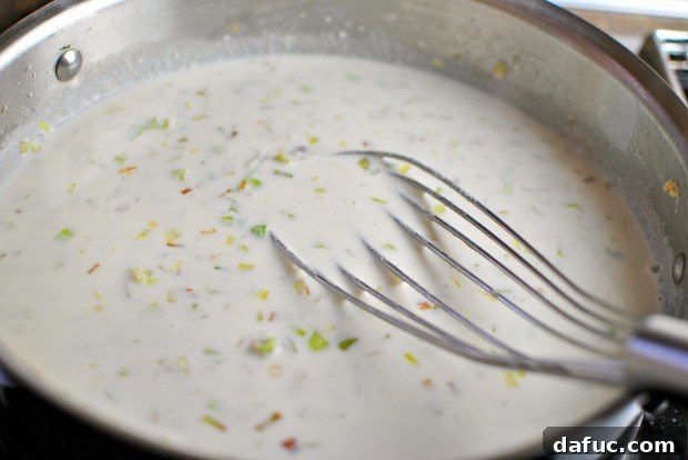 Silky Pancetta, Leek, and Sweet Pea Mac & Cheese 16 Whisking sauce until smooth and thickened