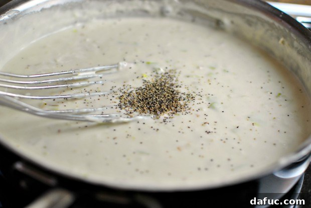 Silky Pancetta, Leek, and Sweet Pea Mac & Cheese 20 Seasoning the cheese sauce with black pepper