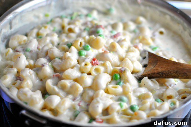 Silky Pancetta, Leek, and Sweet Pea Mac & Cheese 24 Stirring the Creamy Pancetta, Leek and Pea Macaroni and Cheese