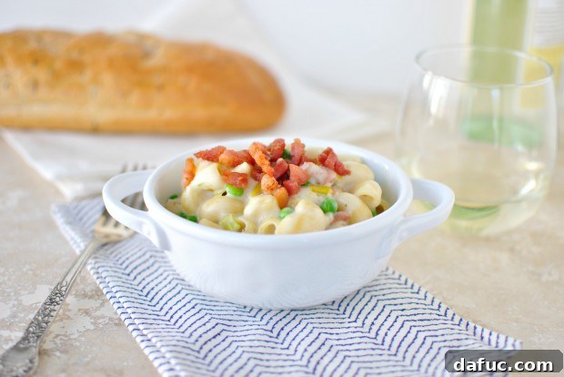 Silky Pancetta, Leek, and Sweet Pea Mac & Cheese 27 Creamy Pancetta, Leek and Pea Macaroni and Cheese close-up