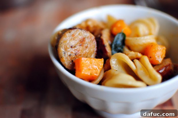 Roasted Butternut Squash, Sausage and Orecchiette Pasta in a Brown Butter Sage Sauce, an ultimate fall comfort food recipe from SimplyScratch.com
