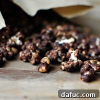 Close-up of baked chocolate popcorn with peanuts